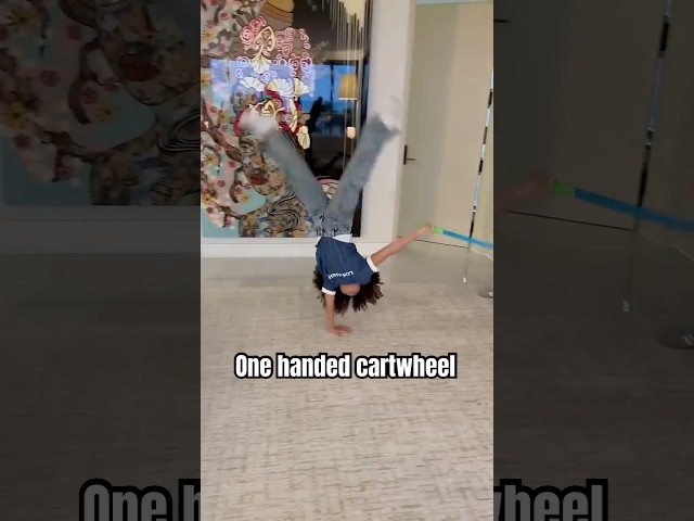 One handed cartwheel! #scarlett shorts #youtubeshorts