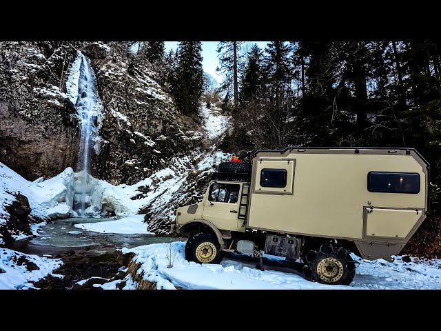 SNOW CAMP UNDER THE WATERFALL WITH A CAMPER