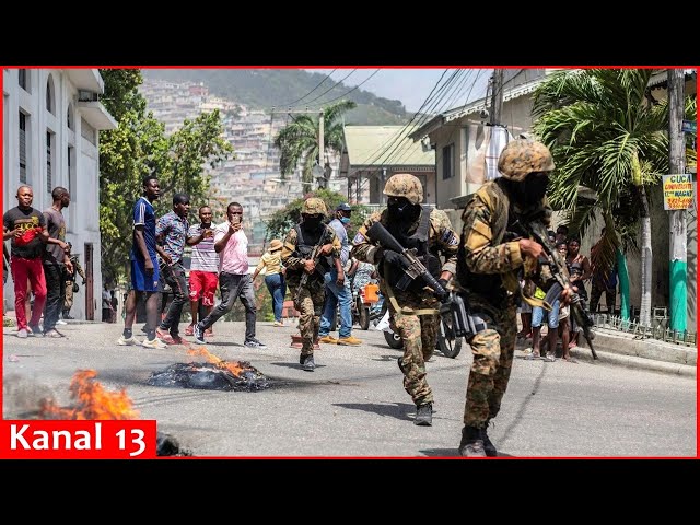 Heavily armed groups attack a neighborhood in Haiti that's home to the country's elite