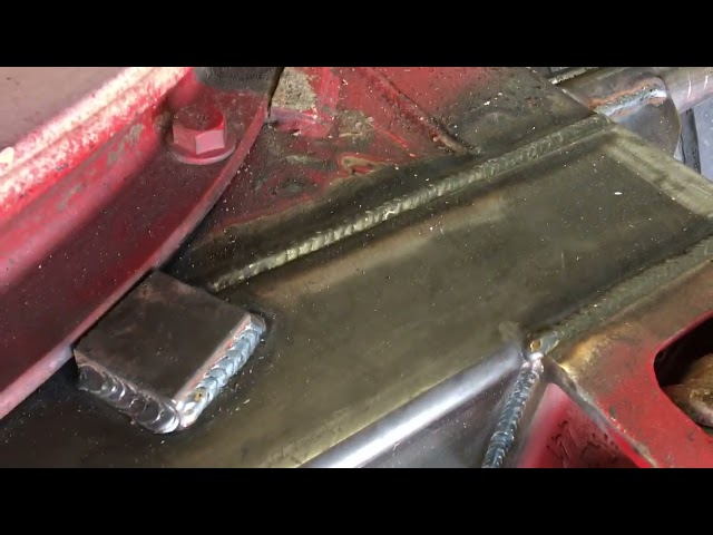 Draw bar repair on a bottom dump trailer.