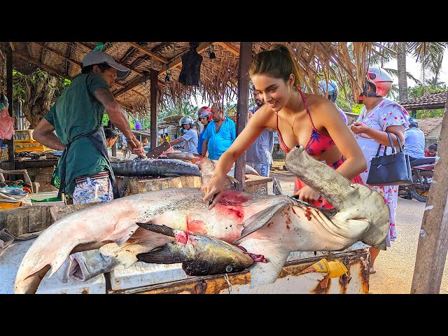 Bustling Street Market Showcasing Huge Fish Cutting Mastery