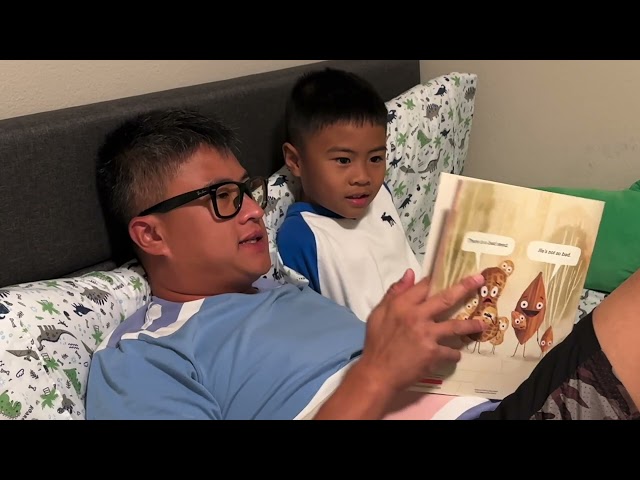 Reading The Bad Seed book to Marcus before he goes to sleep.