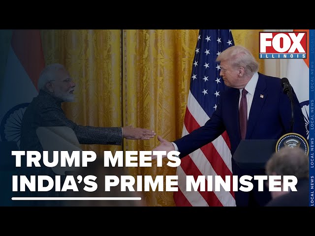 Trump and India Prime Minister Narendra Modi visit with each other in the White House