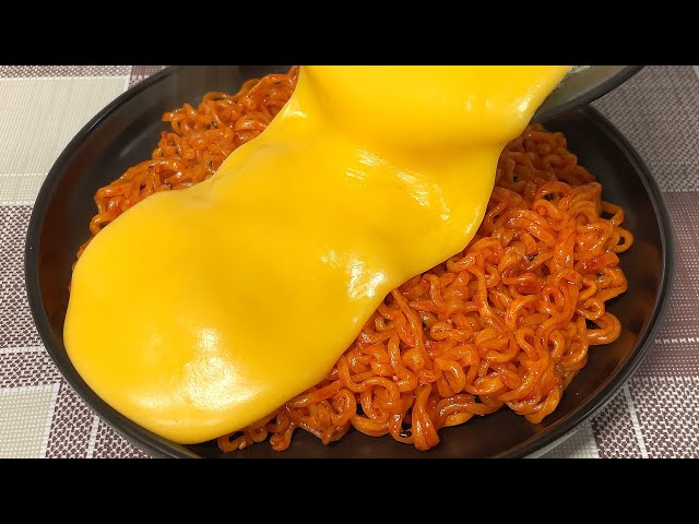 Spicy Buldak Noodles Smothered in Gooey Cheesy Sauce