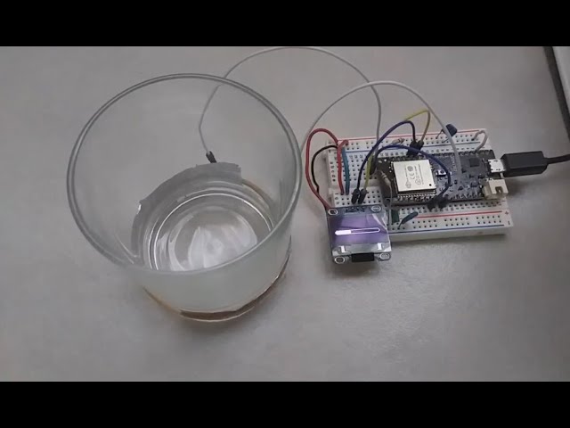 Contactless water level sensor with ESP32 and OLED display