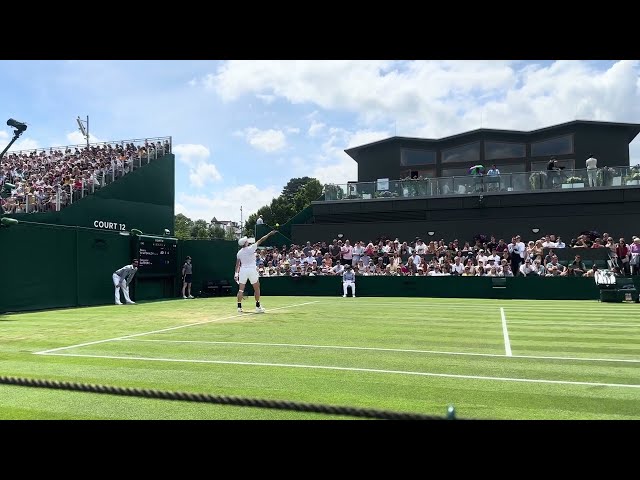 Denis Shapovalov playing tennis at wimbledon tennis 2023 on outside courts