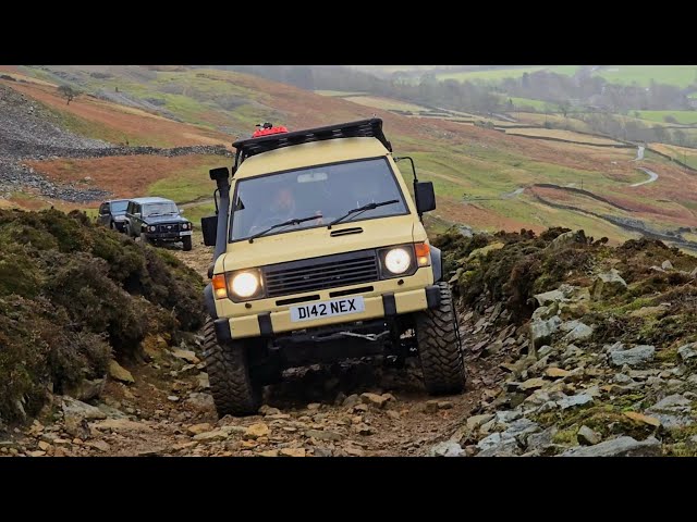 Off Road in a Storm, 4x4 breaks on the trail.