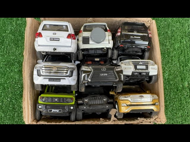 Box full with realistic diecast model cars collection