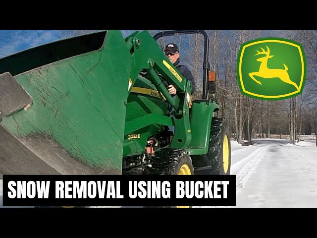 JOHN DEERE TRACTORS  / SNOW  REMOVAL USING BUCKET