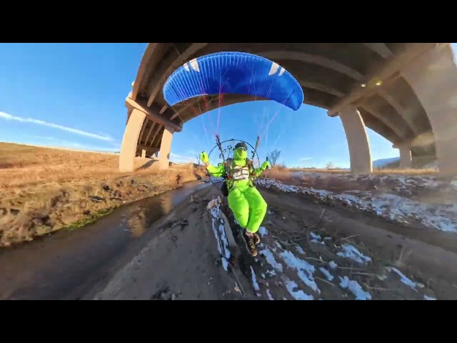 The Grinch Flying in a Grinch costume on a paramotor in Colorado