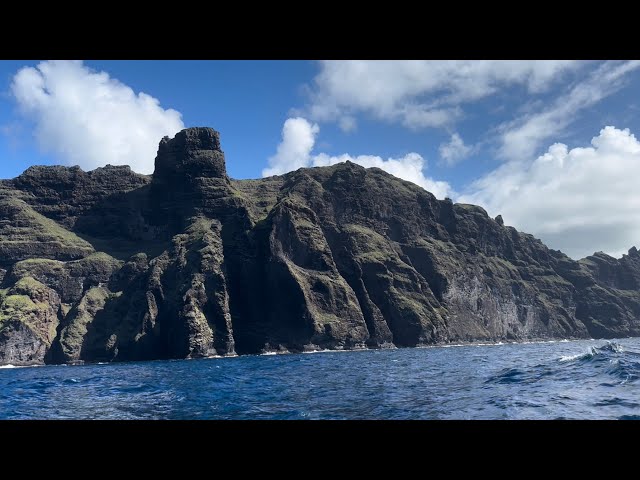 Jeanne sails from dramatic Anaho Bay to Taiohae Bay on Nuku Hiva in French Polynesia