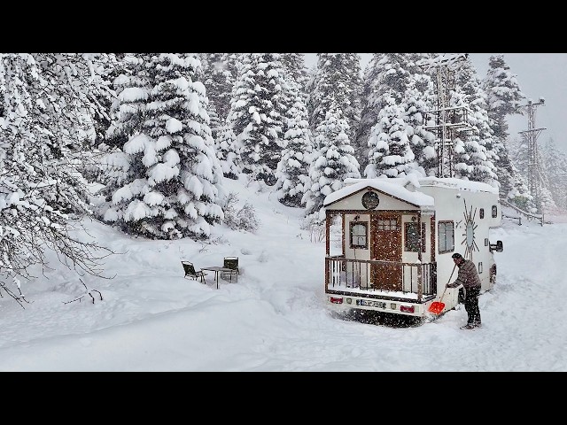 CAMPING IN THE COMFORT OF HOME WITH A TRUCK CARAVAN DURING A SEVERE SNOW STORM