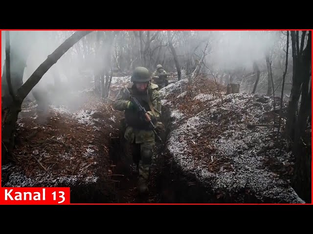 Ukrainian soldiers prepare for battle against Russians in snowy trenches in Donetsk