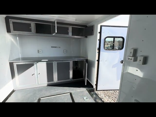 8.5x24 Car Hauler/Cargo Trailer loaded for multi use! Cabinets, windows, A/C, insulated and more!