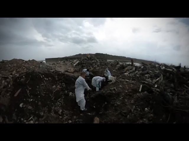 Japan: Volunteers continue search for human remains after tsunami