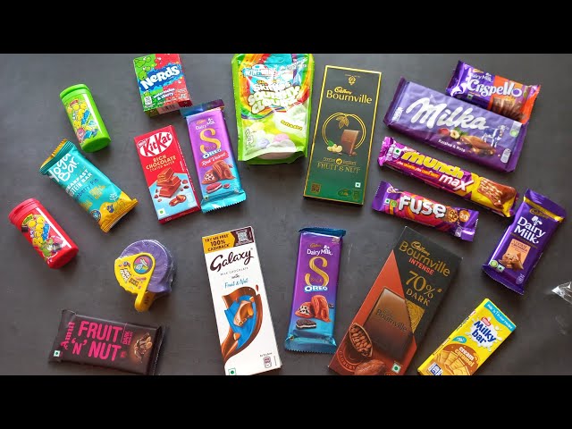 100 candies opening, chocolate a video, lots of chocolates, Cadbury celebration, surprise toys