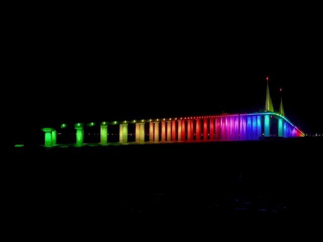 Sunshine Skyway Bridge Illuminated With Pride and Transgender Flag Colors