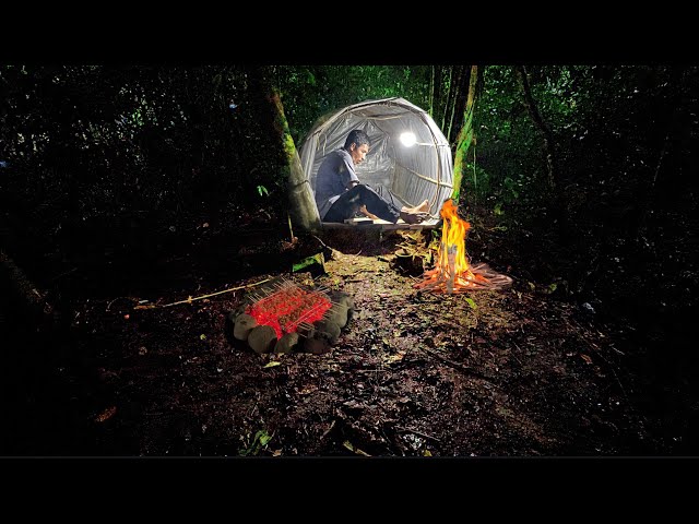 camping in the interior of the forest, cooking in the rain, building a shelter