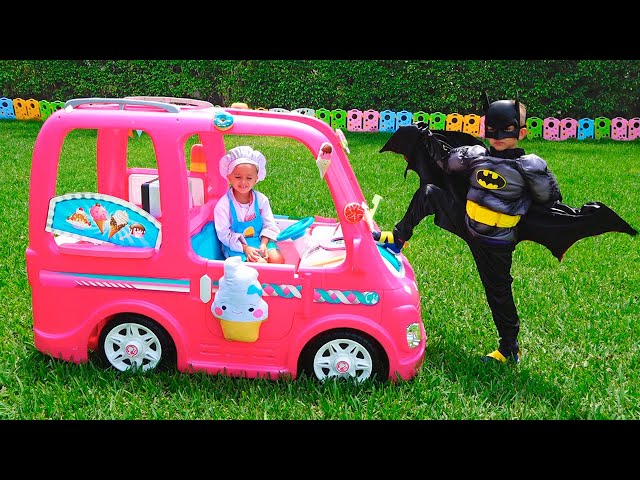 Niki in a pink car meets superheroes