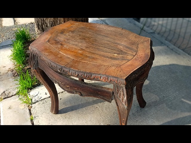 Worn out vintage coffee table. Restoration.