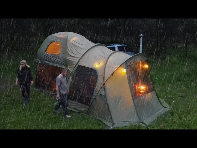 CAMPING IN A TWO-STORY TENT DURING A DOWNPOUR