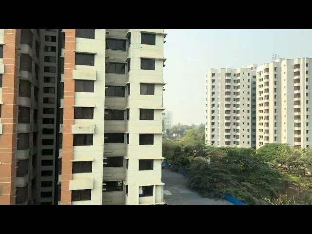 Stunning Dhaka Cityscape: A Scenic View from the Dhaka Metro Rail 🚆🌇