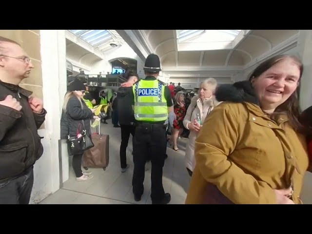 VR180° Barnsley FC fans on their way home singing at Sheffield train station