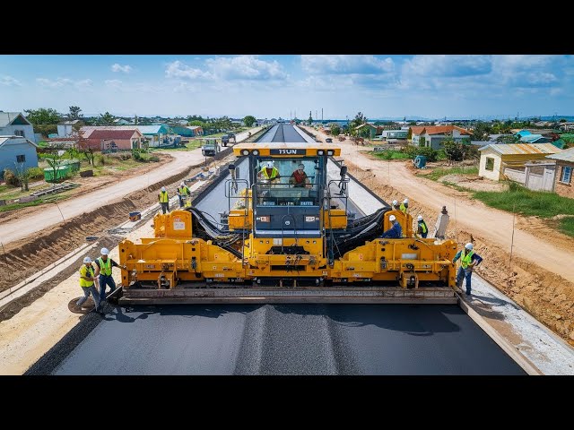 Amazing Construction Workers Operating a Gravel Paving Machine to Lay Gravel on a New Road and Truck