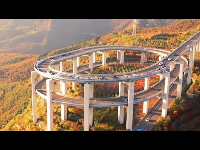 Exploring China's Engineering Marvels: Tianlong Mountain Road & Aizhai Bridge.