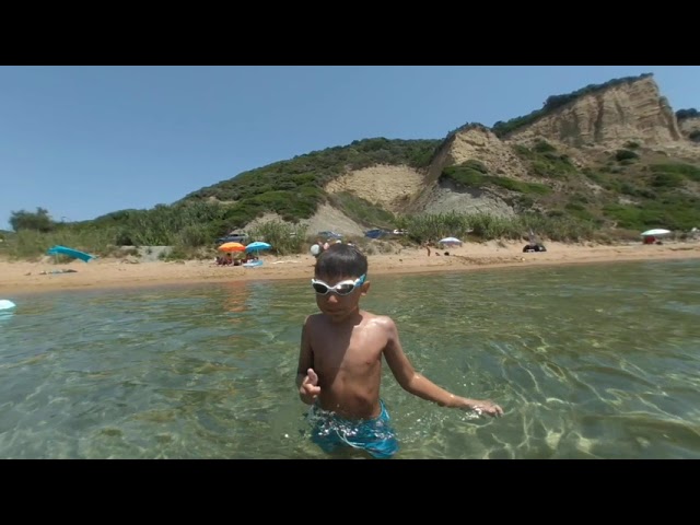 VR180 Corfu, Greece - Gardenos Beach playing in the water