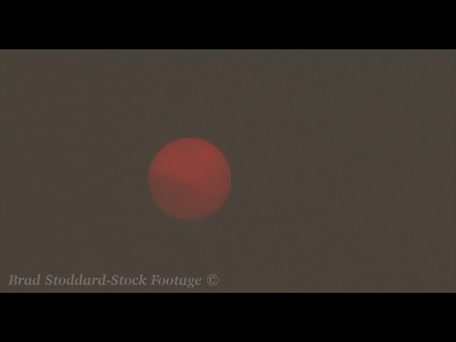 NM062 Fiery Red Sun Moves Thru Smoke Filled Sky preview