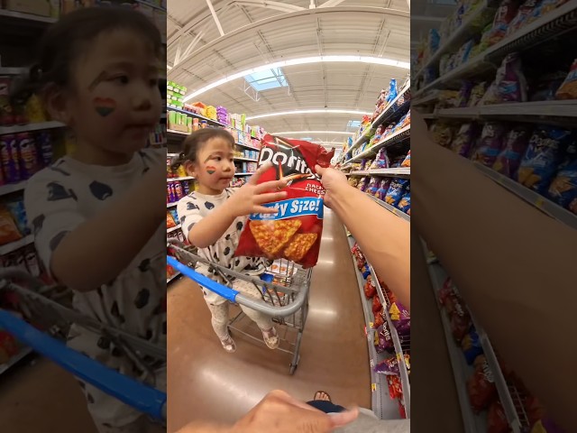 Shop! Chloe realized the Doritos she had were small and wanted to swap for a larger package.