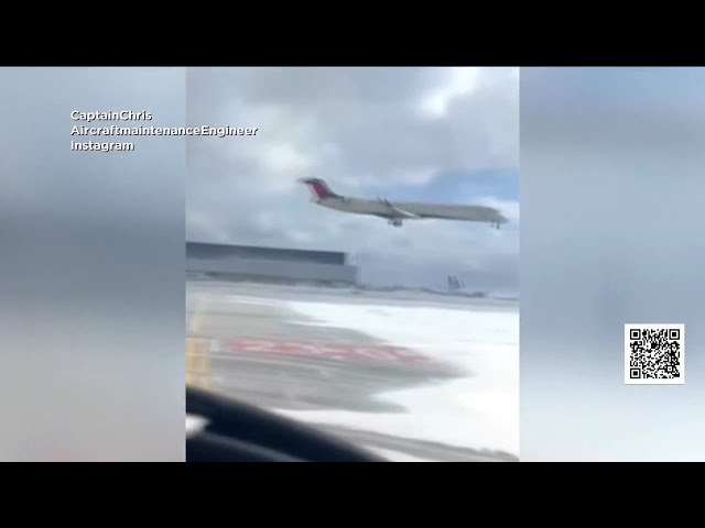 Watch Delta flight flip over while landing