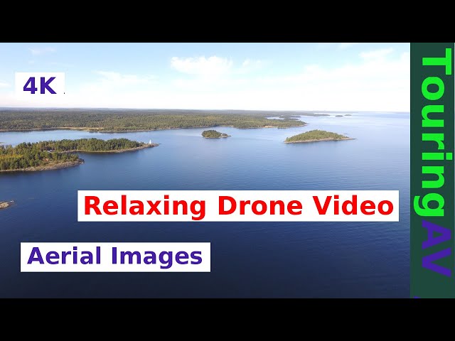 Drone Video, Lake Superior, Historic Wooden Lighthouse on Rocky Shoreline, Aeiral Reveal Shot