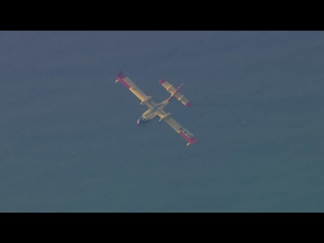 Firefighters battle Palisades wildfire with ocean water