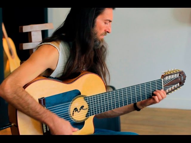 Estas Tonne plays his new 10 string guitar for the first time