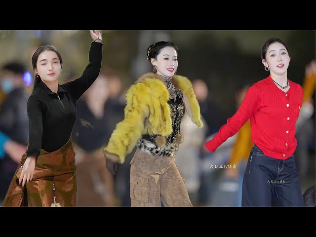 Beautiful Tibetan women dancing happily to celebrate Chinese New Year