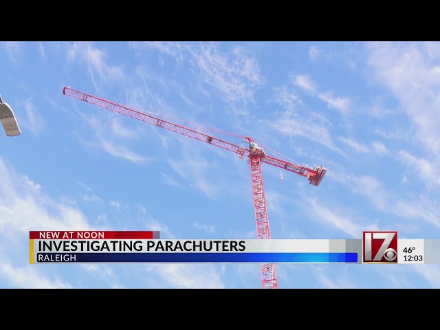 2 men charged after parachuting off crane in downtown Raleigh, police say