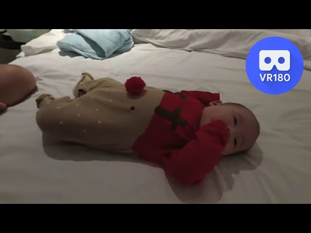 [VR180 5.7k] Baby Riley wearing a cute reindeer suit | Vuze XR 180° 3D