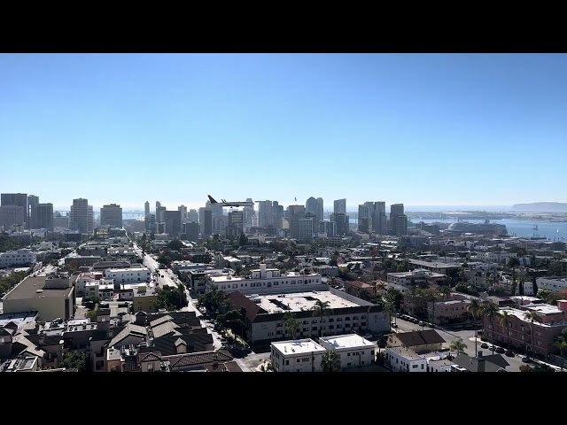 Amazing 4K San Diego View of Downtown and Plane Landing