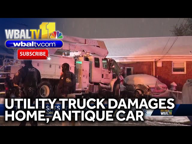 House, antique car damaged by utility vehicle