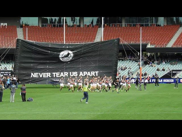 Port Adelaide players running through the 2017 SANFL   Semi Final Port Adel v Eagles banner 4K