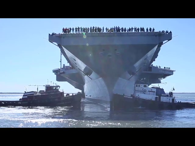 USS Gerald R. Ford (CVN 78) departs the shipyard.