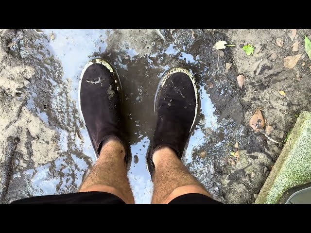 Suede Chelsea boots on short muddy path