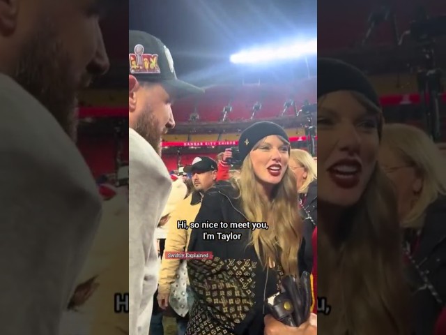 Travis Kelce introducing Taylor Swift to people on the field at the AFC championship