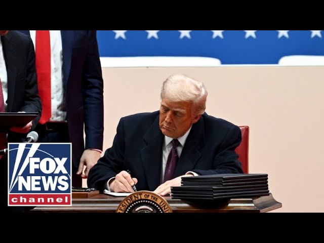 President Trump signs executive orders before supporters