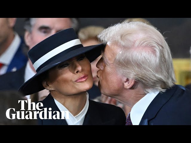 Melania's hat stops Donald Trump kissing her at inauguration ceremony