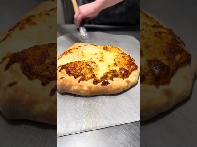 This isn’t just a cheese pizza—it’s a Cheese Lava Pie masterpiece!