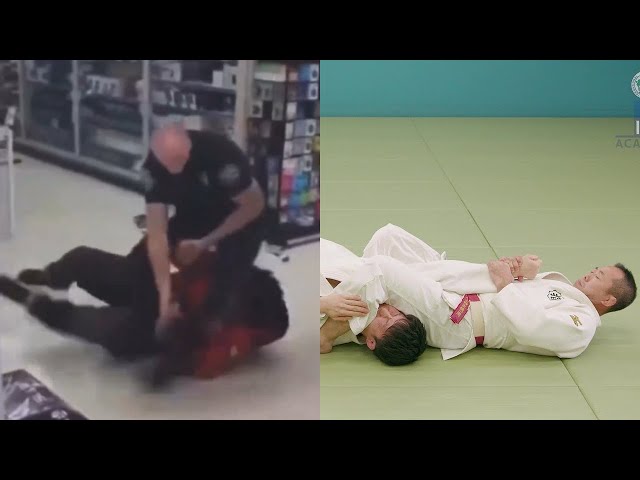 Cop performs an EPIC ARM BAR on duty