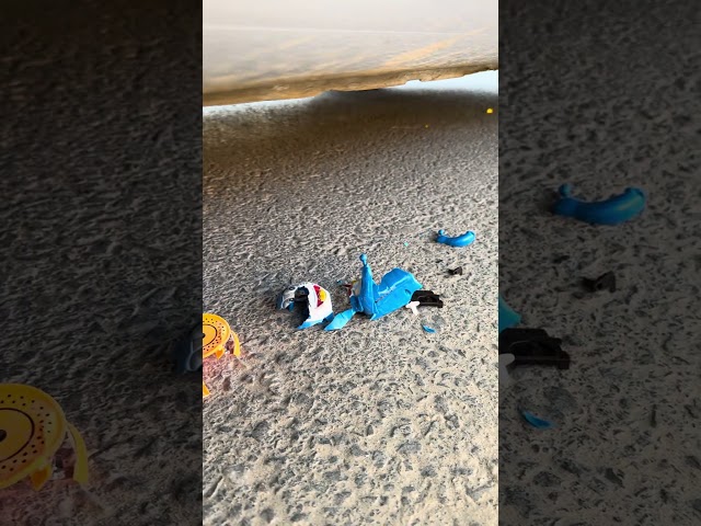 Poor Dino! Car Tire vs. Toy Dinosaur